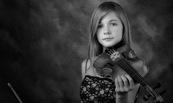 A black and white studio portrait created by Isabelle Guillen in A black and white studio portrait created by Isabelle Guillen in