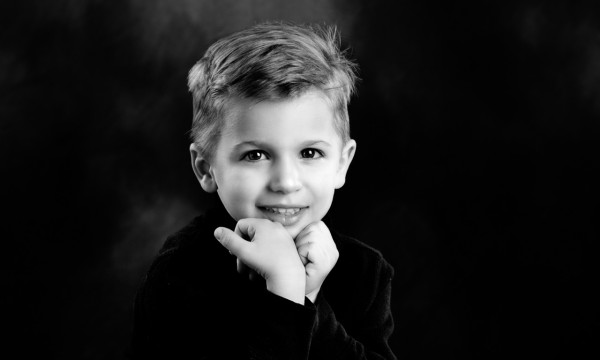A black and white studio portrait created by Isabelle Guillen in A black and white studio portrait created by Isabelle Guillen in