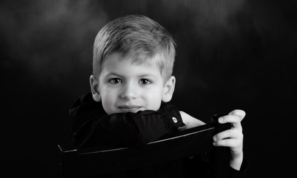 A black and white studio portrait created by Isabelle Guillen in A black and white studio portrait created by Isabelle Guillen in