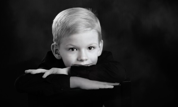 A black and white studio portrait created by Isabelle Guillen in A black and white studio portrait created by Isabelle Guillen in