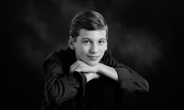 A black and white studio portrait created by Isabelle Guillen in A black and white studio portrait created by Isabelle Guillen in