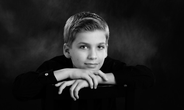 A black and white studio portrait created by Isabelle Guillen in A black and white studio portrait created by Isabelle Guillen in