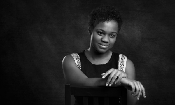 A black and white studio portrait created by Isabelle Guillen in A black and white studio portrait created by Isabelle Guillen in