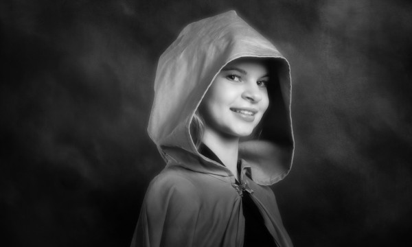 A black and white studio portrait created by Isabelle Guillen in A black and white studio portrait created by Isabelle Guillen in