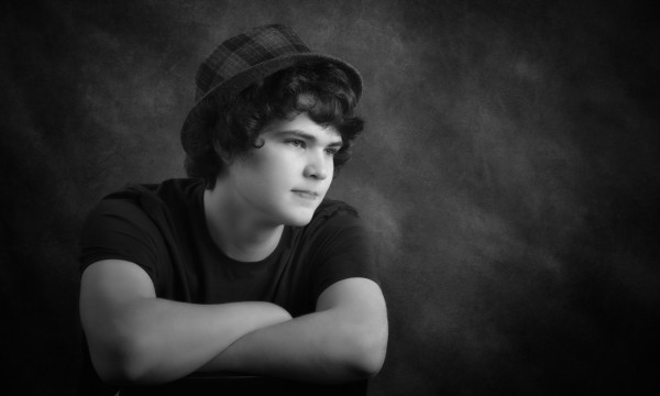 A black and white studio portrait created by Isabelle Guillen in A black and white studio portrait created by Isabelle Guillen in