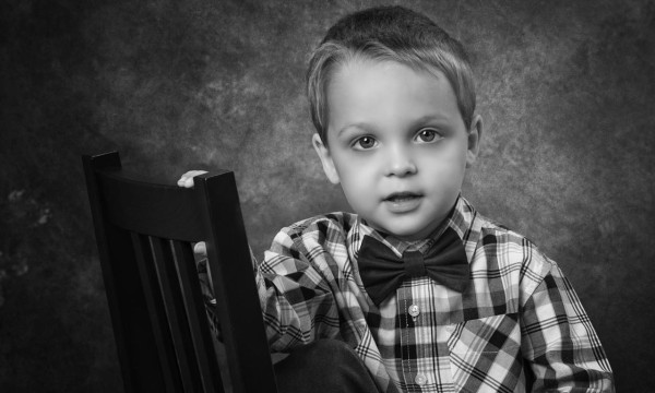 A black and white studio portrait created by Isabelle Guillen in A black and white studio portrait created by Isabelle Guillen in