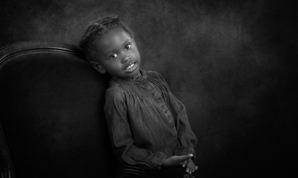 A black and white studio portrait created by Isabelle Guillen in A black and white studio portrait created by Isabelle Guillen in