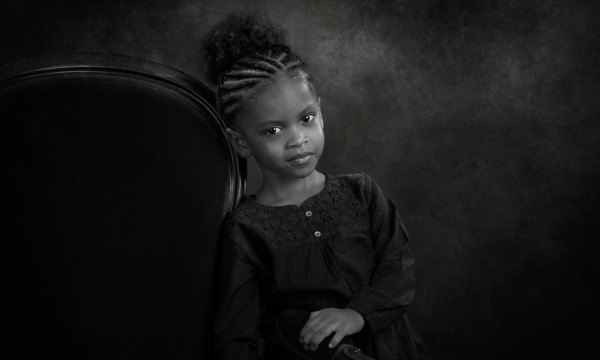 A black and white studio portrait created by Isabelle Guillen in A black and white studio portrait created by Isabelle Guillen in