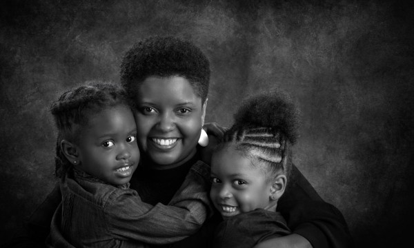 A black and white studio portrait created by Isabelle Guillen in A black and white studio portrait created by Isabelle Guillen in