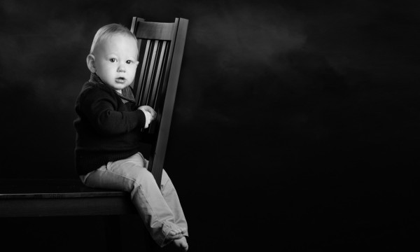 A black and white studio portrait created by Isabelle Guillen in A black and white studio portrait created by Isabelle Guillen in