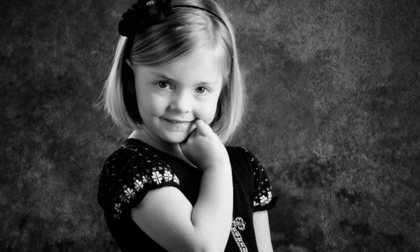 A black and white studio portrait created by Isabelle Guillen in A black and white studio portrait created by Isabelle Guillen in